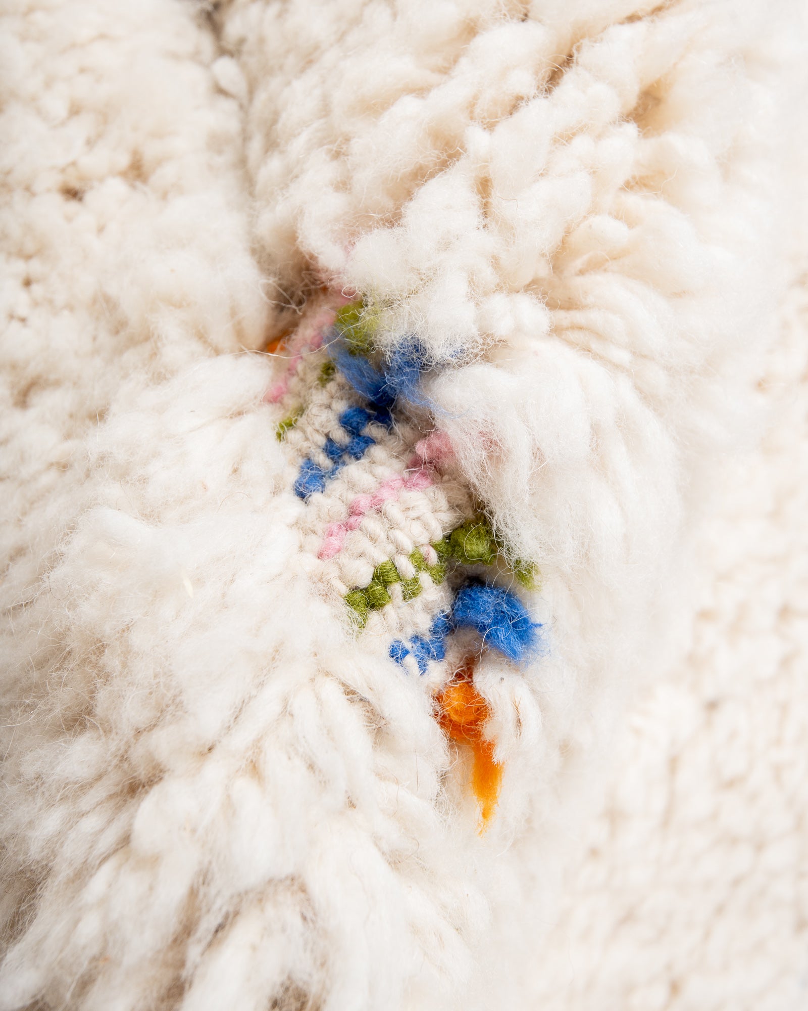 Modern, designer, handcrafted Berber rug from Morocco. Beniourain carpet with beautiful colours and patterns and fluffy wool texture.